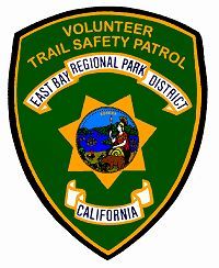 the shield of the Volunteer Trail Safety Patrol
